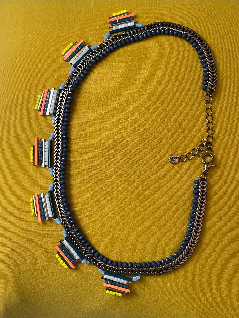 A vintage intricate necklace 19” long. Well made. Tag attached stamped ‘Re’